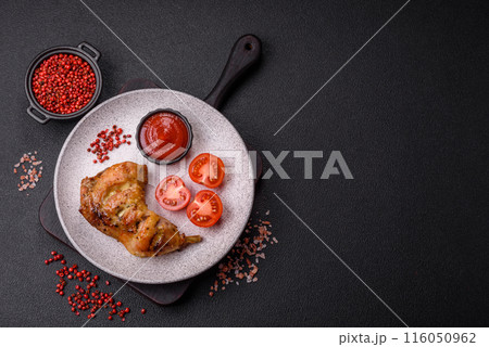 Delicious grilled chicken leg or quarter with salt and spices 116050962