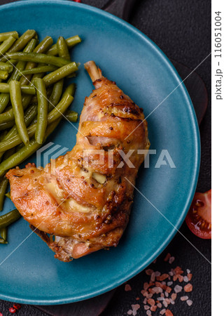 Delicious grilled chicken leg or quarter with salt and spices Delicious grilled chicken leg or quarter with salt and spices 116051004