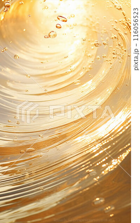 Beautiful gold wave in the ocean. Water surface in the golden light of the sun at sunset or dawn. Surfer's POV Beautiful gold wave in the ocean. Water surface in the golden light of the sun at sunset or dawn. Surfer's POV 116056523