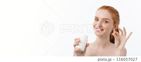 Beautiful Smiling Girl Taking Medication, Holding Bottle With Pills. Healthy Happy Female Eating Pill. Vitamins And Supplements,Diet Nutrition Concept Beautiful Smiling Girl Taking Medication, Holding Bottle With Pills. Healthy Happy Female Eating Pill. Vitamins And Supplements,Diet Nutrition Concept 116057027