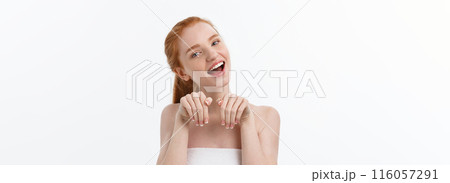 Beauty portrait of a smiling young woman with looking at camera isolated over gray background 116057291