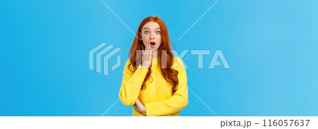 Wow stunning. Surprised girl found out secret or gossiping left shocked knowing truth. Astonished redhead woman stare camera speechless, gasping cover opened mouth amazed, blue background Wow stunning. Surprised girl found out secret or gossiping left shocked knowing truth. Astonished redhead woman stare camera speechless, gasping cover opened mouth amazed, blue background 116057637