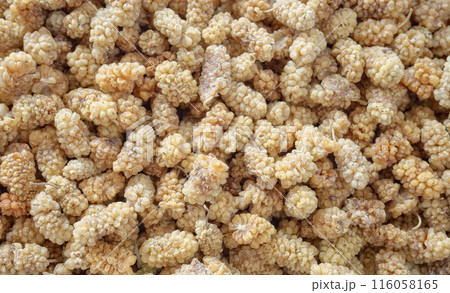 Close up photo of dried white mulberry, selective focus. Close up photo of dried white mulberry, selective focus. 116058165