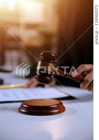 Law theme, gavel or mallet of the judge, lawyer enforcement officers, evidence-based cases taken into account in the court abount business, legislation. 116060072