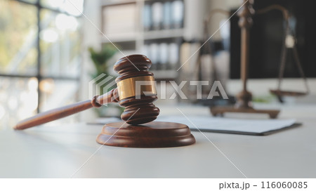 Law theme, gavel or mallet of the judge, lawyer enforcement officers, evidence-based cases taken into account in the court abount business, legislation. Law theme, gavel or mallet of the judge, lawyer enforcement officers, evidence-based cases taken into account in the court abount business, legislation. 116060085