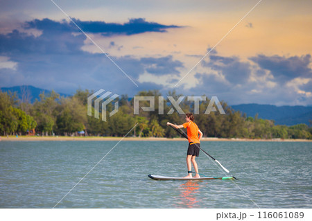 Man on stand up paddle. Water and beach sport 116061089