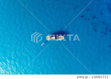 Summertime vacation. Drone view on the yacht. Yacht on the sea as a background.  116061711