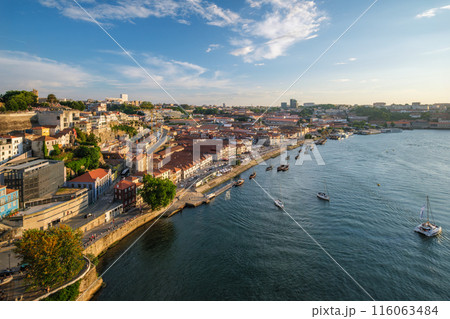View of Vila Nova de Gaia city, Porto, Portugal on sunset View of Vila Nova de Gaia city, Porto, Portugal on sunset 116063484