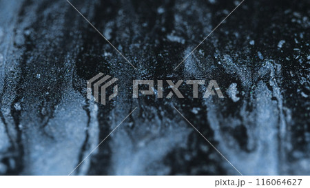 Wet glitter texture. Sparkling ink spill. Defocused black silver white color metallic shimmering particles paint mix fluid emulsion flow abstract art background. Wet glitter texture. Sparkling ink spill. Defocused black silver white color metallic shimmering particles paint mix fluid emulsion flow abstract art background. 116064627
