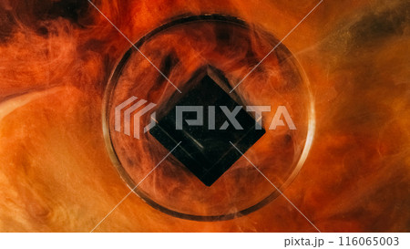 Glitter smoke wave. Ink water drop. Defocused orange red color vapor floating round glass cube geometric abstract art background. 116065003