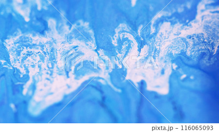 Ink swirl. Glitter fluid wave. Defocused blue white color sparkling sand particles paint splash pigment mix acrylic dye liquid spill abstract art background. 116065093