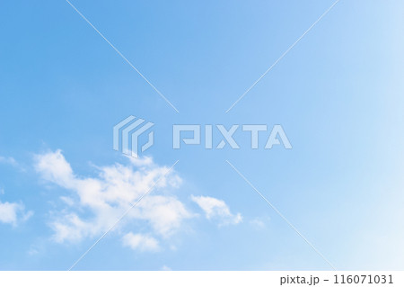 beautiful blue sky and white fluffy group of clouds with sunrise in the morning, natural background beautiful blue sky and white fluffy group of clouds with sunrise in the morning, natural background 116071031