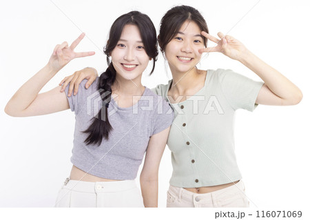 Two young beautiful smiling asian teenager female in summer clothes 116071069
