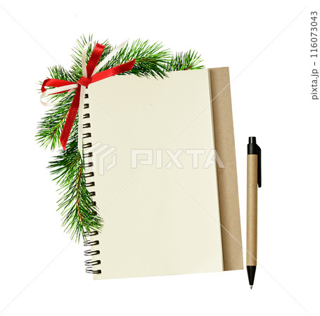 Empty notebook and pen with Christmas decorations isolated on white. Holiday template. Empty notebook and pen with Christmas decorations isolated on white. Holiday template. 116073043