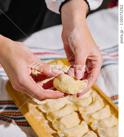 Traditional dumpling preparation by hands Traditional dumpling preparation by hands 116073262