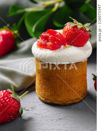 Fresh strawberry tarts on grey backdrop Fresh strawberry tarts on grey backdrop 116073347
