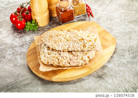 Breaded raw breaded meat schnitzel 116074516