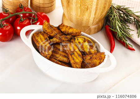 Golden baked potato Idaho with spices Golden baked potato Idaho with spices 116074806