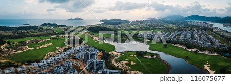 Aerial view of modern golf course resort in Hainan island , China Aerial view of modern golf course resort in Hainan island , China 116075677