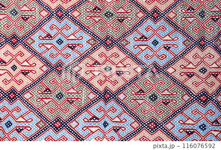 Texture of iranian traditional handmade wool carpet with geometric pattern Texture of iranian traditional handmade wool carpet with geometric pattern 116076592