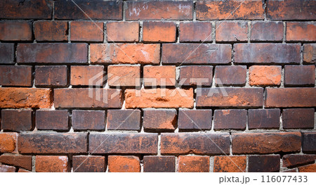 Old and aged red brick wall texture background with vignetting. Old and aged red brick wall texture background with vignetting. 116077433