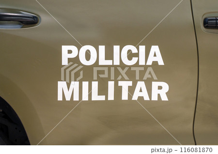 Inscription MILITARY POLICE on the door of a Spain Army patrol car in Spanish close up Inscription MILITARY POLICE on the door of a Spain Army patrol car in Spanish close up 116081870