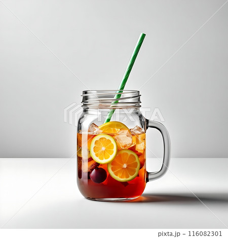 Summer fruit and citrus cocktail in a jar with berries and a straw, isolated on white background. Refreshing blend perfect for hot days 116082301