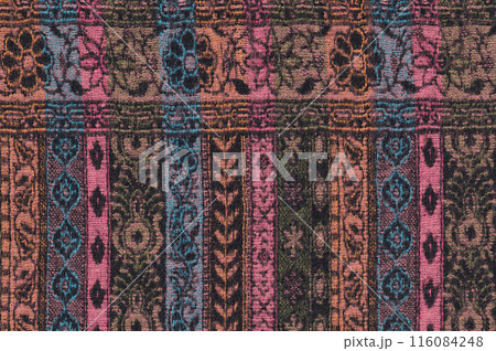 Nepalese textile background. Woven ethnic fabric texture 116084248