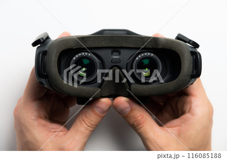 Black fpv or virtual reality glasses with lenses, on a white background. Close-up view from inside Black fpv or virtual reality glasses with lenses, on a white background. Close-up view from inside 116085188
