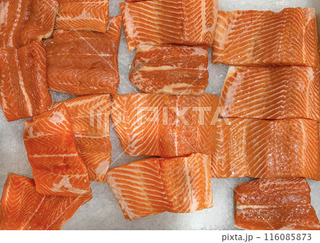 Top view of fresh salmon fillet display for selling in wet market. Top view of fresh salmon fillet display for selling in wet market. 116085873