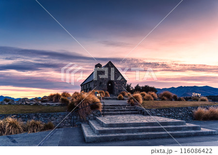 Holy the Church of the good shepherd with colorful sky on shore of Lake Tekapo at New Zealand 116086422