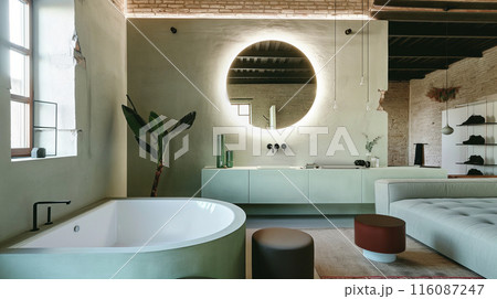 Modern Bathroom With Tub And Large Round Mirror In Contemporary Loft 116087247