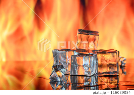 Ice melting with flames on background. 1 116089084