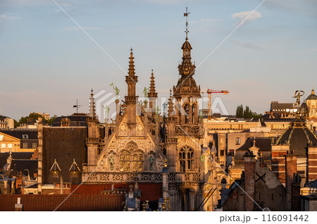 Brussels Old Town, Belgium - High angle view over the historical city center and the Saint Nicholas church during the golden hour Brussels Old Town, Belgium - High angle view over the historical city center and the Saint Nicholas church during the golden hour 116091442