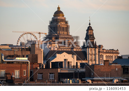 Brussels Old Town, Belgium - High angle view over the historical city center with the dome of the Court House during golden hour 116091453