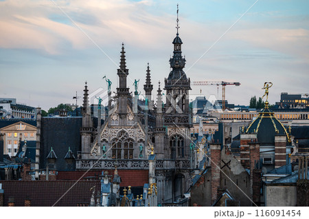 Brussels Old Town, Belgium - High angle view over the historical city center and the Saint Nicholas church during the golden hour Brussels Old Town, Belgium - High angle view over the historical city center and the Saint Nicholas church during the golden hour 116091454