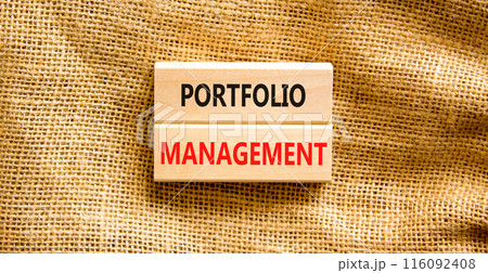 Portfolio management symbol. Concept words Portfolio management on beautiful wooden block. Beautiful canvas background. Business Portfolio management concept. Copy space. Portfolio management symbol. Concept words Portfolio management on beautiful wooden block. Beautiful canvas background. Business Portfolio management concept. Copy space. 116092408