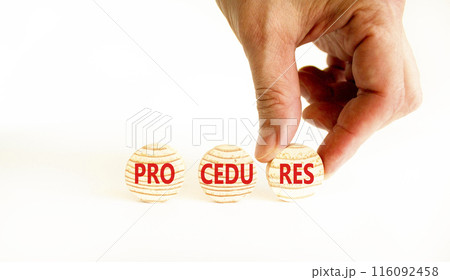 Procedures symbol. Concept word Procedures on beautiful wooden circles. Beautiful white table white background. Businessman hand. Business procedures concept. Copy space. 116092458