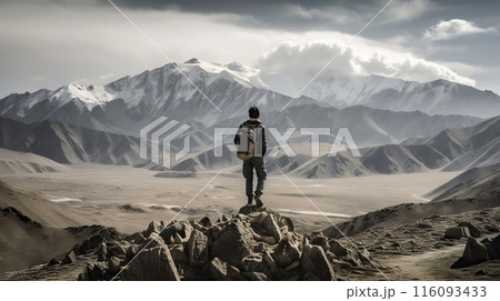 Explorer stand in front of high mountain peak landscape. Generative AI 116093433