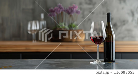 Minimalist Wine Bottle and Glass on Modern Kitchen Counter. 116095053