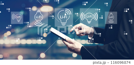 LiFi theme with businessman using a tablet 116096874