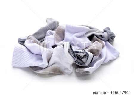 Dirty white socks on white background. 116097904