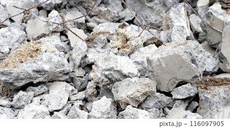 Piles of rubble after house demolition 116097905