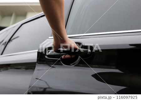 Male hand opening car door Male hand opening car door 116097925