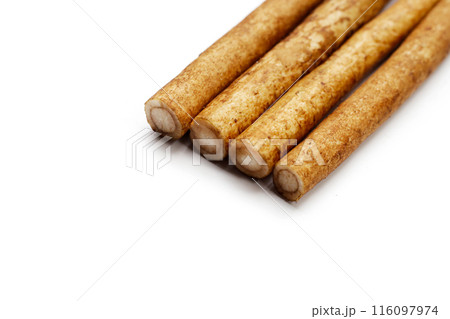 Burdock Root (Gobo) on white background. 116097974