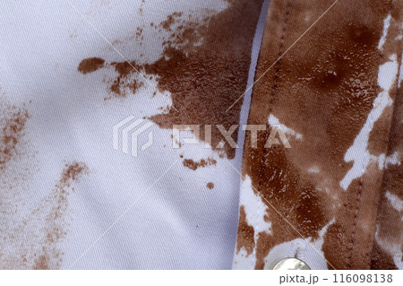 Dirty choclate stain on white shirt 116098138