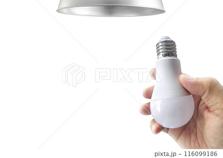 closeup hand changing an electric light bulb, transparent background closeup hand changing an electric light bulb, transparent background 116099186