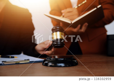 Lawyer, legal advisor, businessman brainstorming information on agreement details Business contracts in legal processing books for accuracy in contract documents. joint financial investment. Lawyer, legal advisor, businessman brainstorming information on agreement details Business contracts in legal processing books for accuracy in contract documents. joint financial investment. 116102959