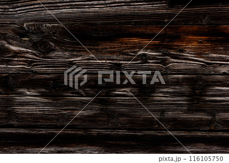 Dark rustic burnt wood background. 116105750