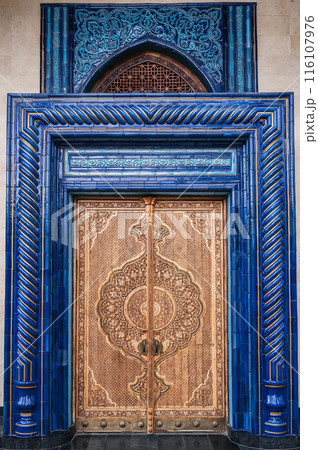 Wooden carved door with oriental pattern Uzbek ornament in the Museum of Victims of Political Repression in Tashkent Wooden carved door with oriental pattern Uzbek ornament in the Museum of Victims of Political Repression in Tashkent 116107976
